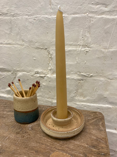 Cream candle stick holder with beeswax candle